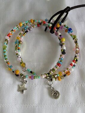 D- Handmade memory wire bracelets set with beads and pendants